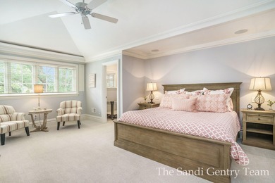 WITH OVER 400' OF PRIME SPRING LAKE WATER FRONTAGE SITS THIS - photo 58