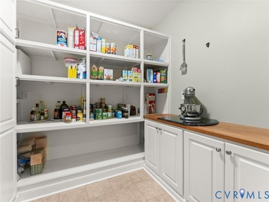 Custom-built and situated on 3.42 private wooded acres, this - photo 11