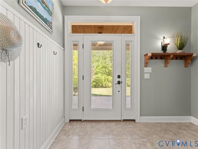 Custom-built and situated on 3.42 private wooded acres, this - photo 22