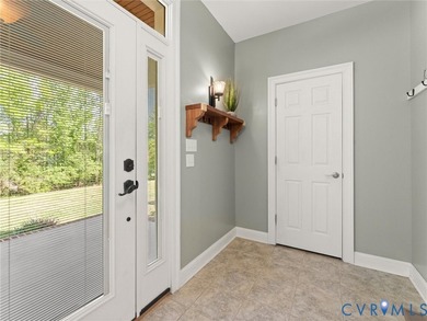 Custom-built and situated on 3.42 private wooded acres, this - photo 23
