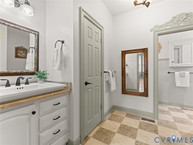 Custom-built and situated on 3.42 private wooded acres, this - photo 26