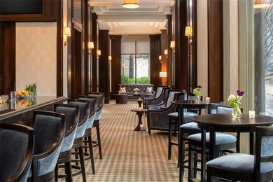 High above Buckhead in the iconic Waldorf Astoria, this