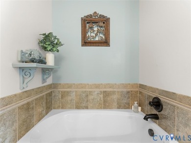Custom-built and situated on 3.42 private wooded acres, this - photo 29