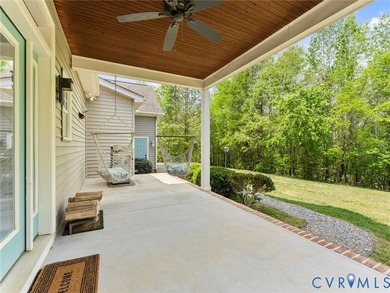 Custom-built and situated on 3.42 private wooded acres, this - photo 38
