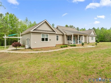 Custom-built and situated on 3.42 private wooded acres, this - photo 39
