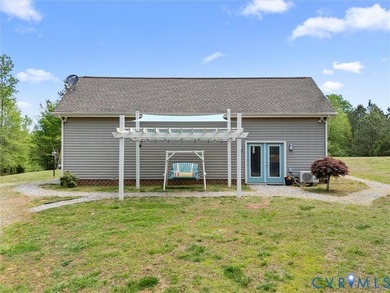 Custom-built and situated on 3.42 private wooded acres, this - photo 40
