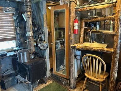 Escape to your own private retreat with this artistic cabin set - photo 22