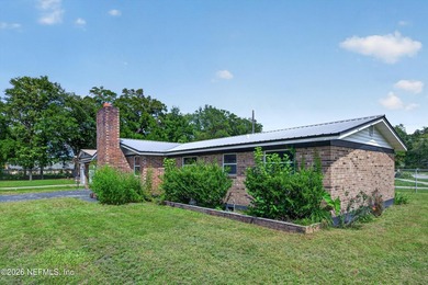 This solid brick 3-bedroom, 2-bath home offers the perfect blend - photo 44