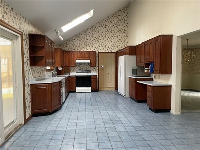 Large home with open living space in desirable SW Millcreek