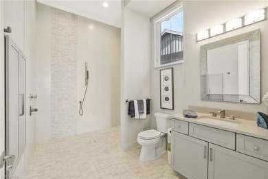 This coastal-inspired estate, built by Braun Builders, offers 5