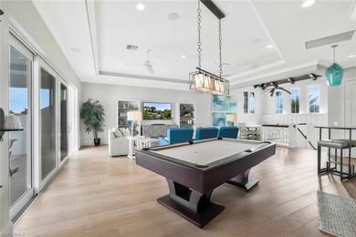 This coastal-inspired estate, built by Braun Builders, offers 5