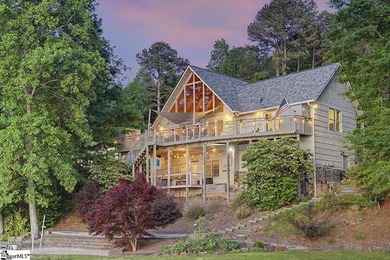 Set along more than 200 feet of water frontage, this exceptional - photo 2