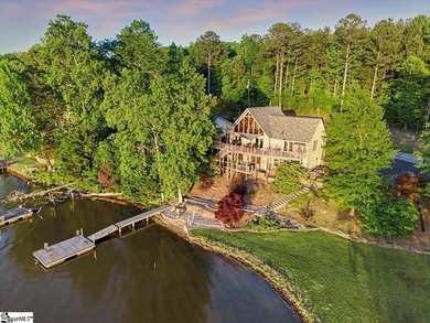 Set along more than 200 feet of water frontage, this exceptional - photo 3