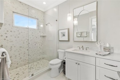 This coastal-inspired estate, built by Braun Builders, offers 5 - photo 23