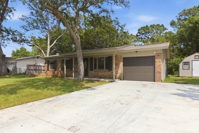 Welcome to your new home! This beautifully remodeled brick home - photo 4