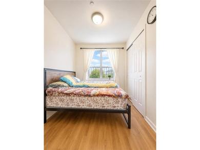 A Cozy & Spacious First-Floor Condo with Basement & Parking in a - photo 5