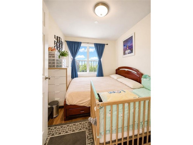 A Cozy & Spacious First-Floor Condo with Basement & Parking in a - photo 6