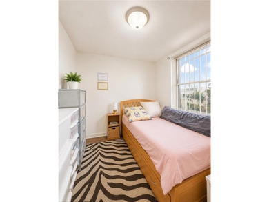 A Cozy & Spacious First-Floor Condo with Basement & Parking in a - photo 9