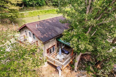 Tucked away in the mountains of West Virginia, this lovely - photo 17