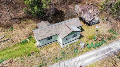 Tucked away in the mountains of West Virginia, this lovely - photo 34