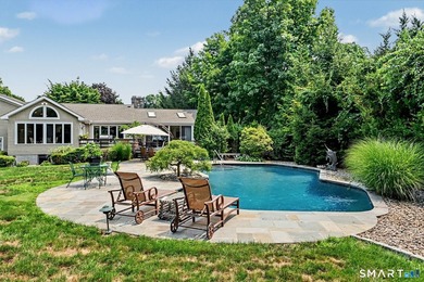 Tucked away on a quiet, tree-lined street in North Stamford - photo 1