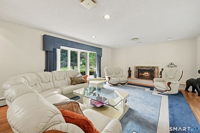 Tucked away on a quiet, tree-lined street in North Stamford - photo 4