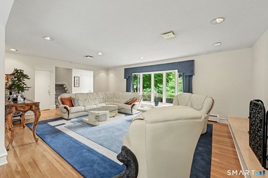 Tucked away on a quiet, tree-lined street in North Stamford - photo 5