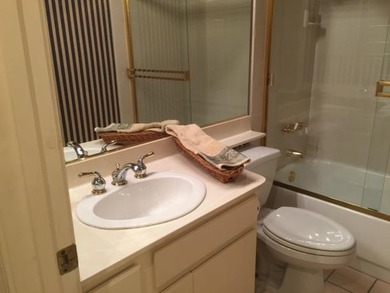 This lovely single story condominium is located on the 12th