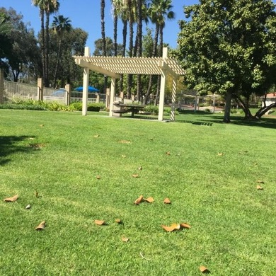 This lovely single story condominium is located on the 12th