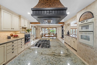 Nestled in the prestigious and highly sought-after Hidden Oaks - photo 16