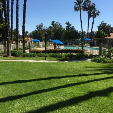 This lovely single story condominium is located on the 12th