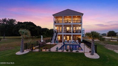 Welcome to an extraordinary soundfront residence in prestigious - photo 3