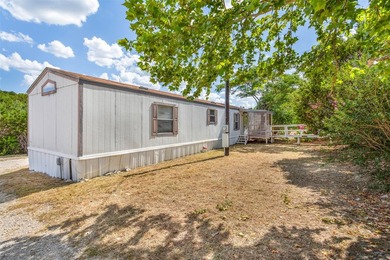 Nestled among mature greenery, this inviting 3 bedroom, 2 bath - photo 3