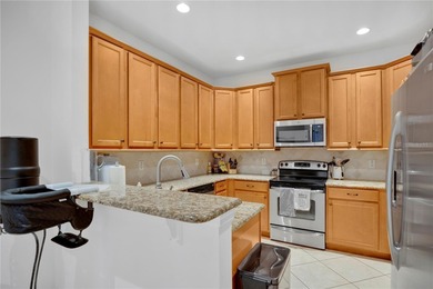 Beautiful move-in-ready end-unit townhome located in the