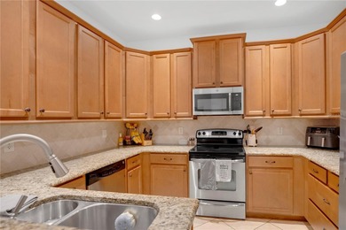 Beautiful move-in-ready end-unit townhome located in the