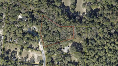 large lot just under an acre. lot comes with one septic tank and - photo 1
