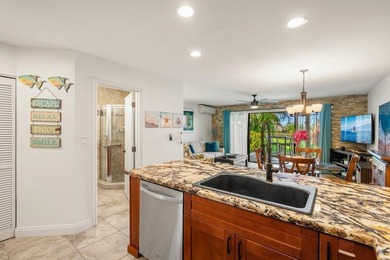 Discover Unit J110 at Maui Kamaole, a stunning 1-bedroom - photo 15