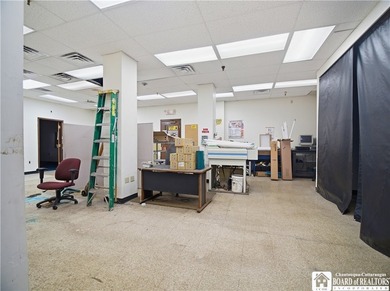 Large well maintained brick building with ample parking situated - photo 11