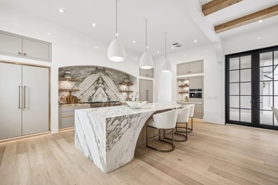 Discover refined coastal living in this stunning custom-designed - photo 11