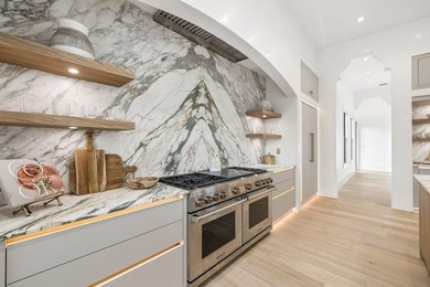Discover refined coastal living in this stunning custom-designed - photo 13