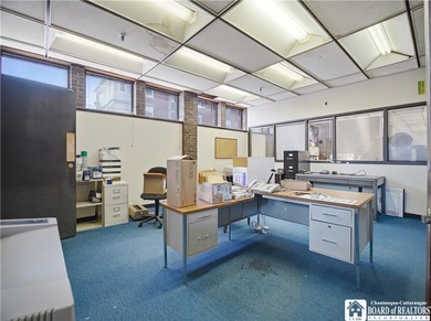 Large well maintained brick building with ample parking situated - photo 14