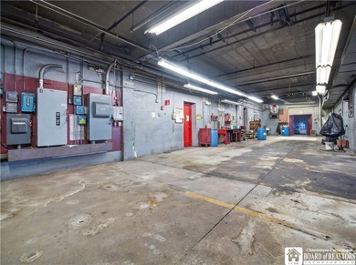 Large well maintained brick building with ample parking situated - photo 17