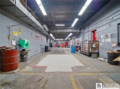 Large well maintained brick building with ample parking situated - photo 20
