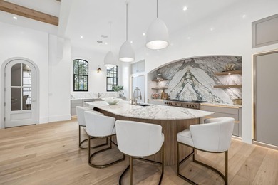 Discover refined coastal living in this stunning custom-designed - photo 24