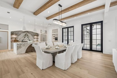 Discover refined coastal living in this stunning custom-designed - photo 26