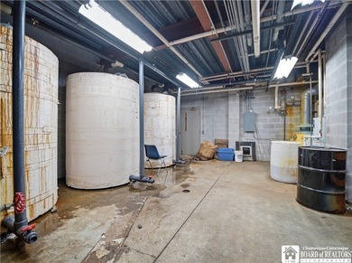 Large well maintained brick building with ample parking situated - photo 28