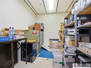 Large well maintained brick building with ample parking situated - photo 29