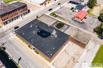 Large well maintained brick building with ample parking situated - photo 37