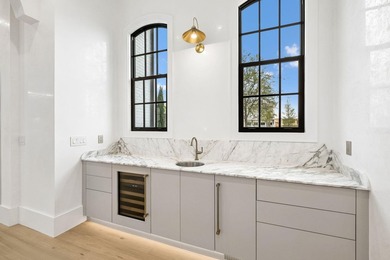 Discover refined coastal living in this stunning custom-designed - photo 38