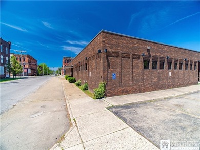 Large well maintained brick building with ample parking situated - photo 39
